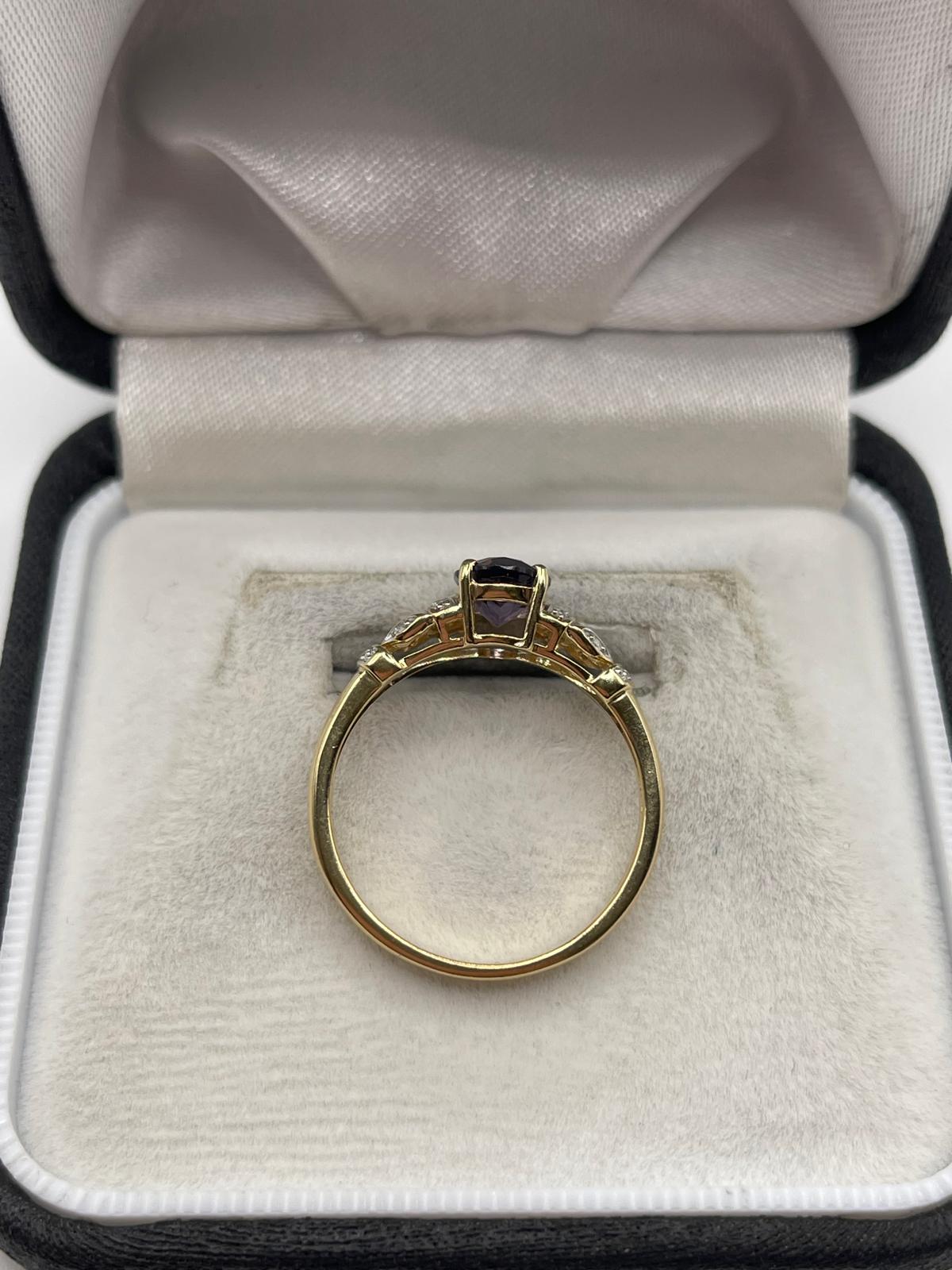 9ct gold iolite and diamond ring