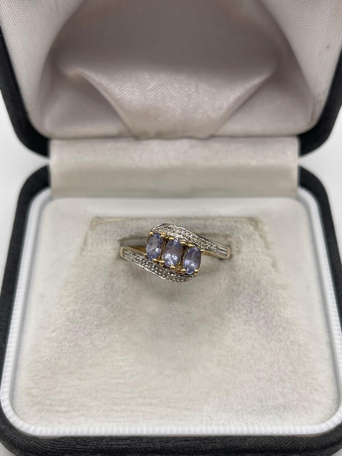 9ct gold tanzanite and diamond ring