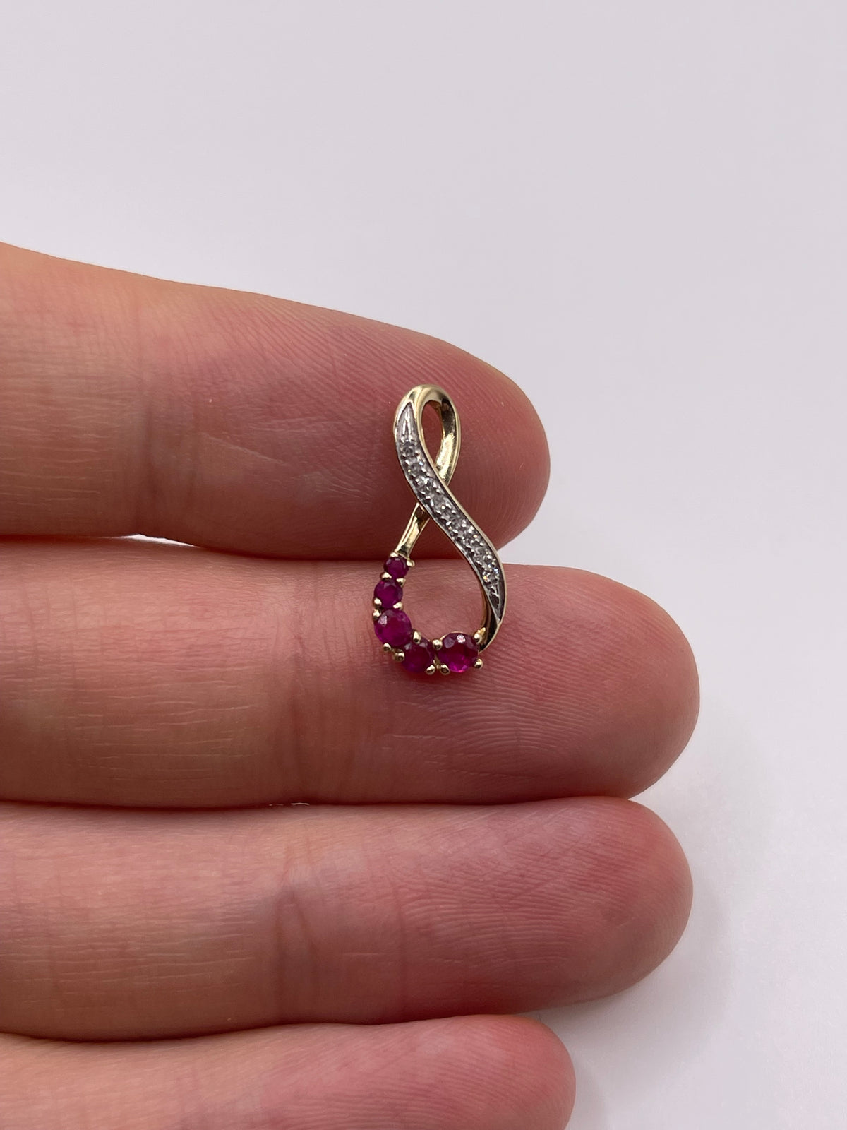 9ct gold ruby and diamond pendant