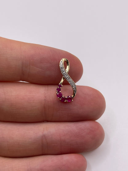 9ct gold ruby and diamond pendant