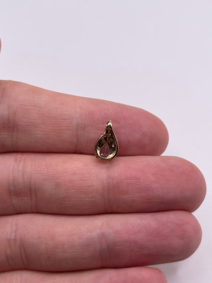9ct gold topaz and diamond pendant