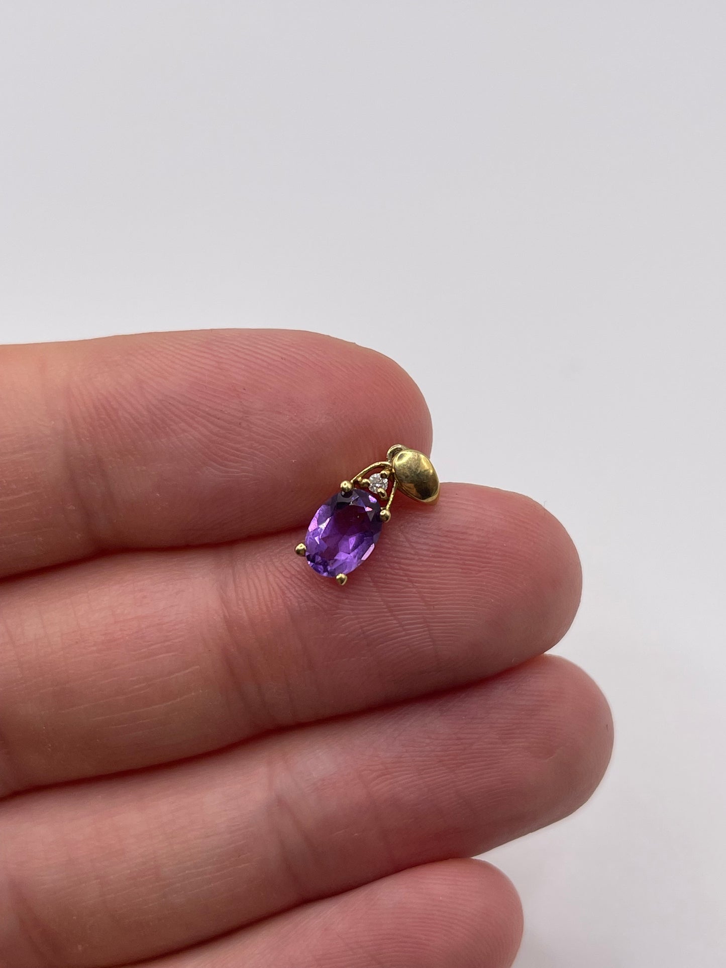9ct gold amethyst and diamond pendant