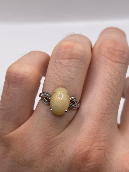 9ct white gold opal and diamond ring