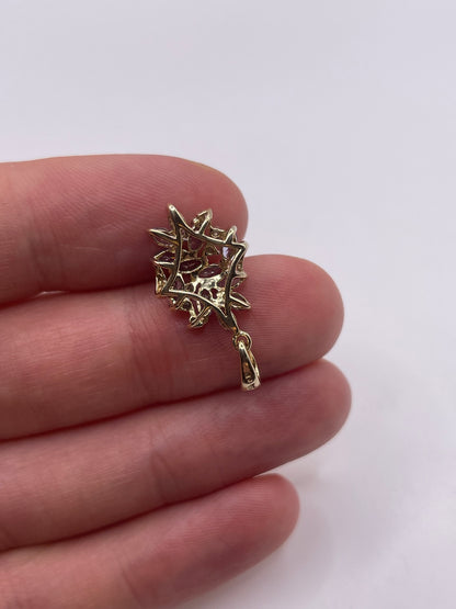 9ct gold tanzanite and diamond pendant