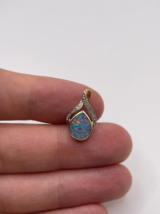 9ct gold black opal and diamond pendant