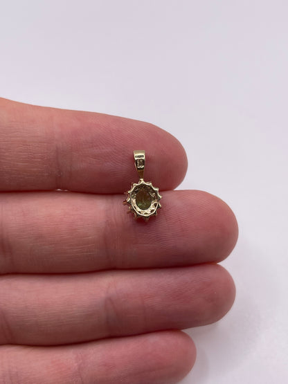 9ct gold tsavorite garnet and diamond pendant