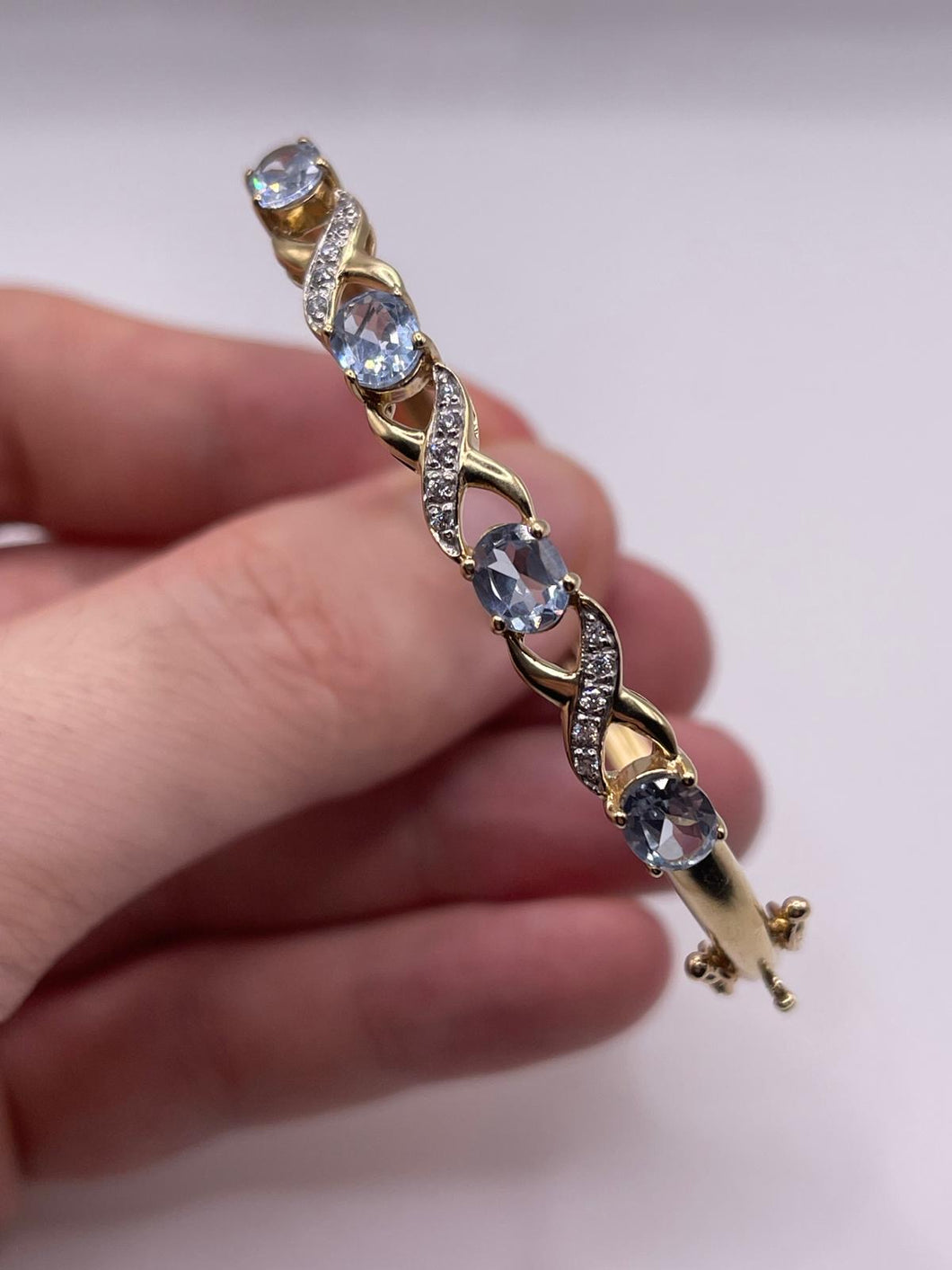 9ct gold blue topaz and diamond bangle