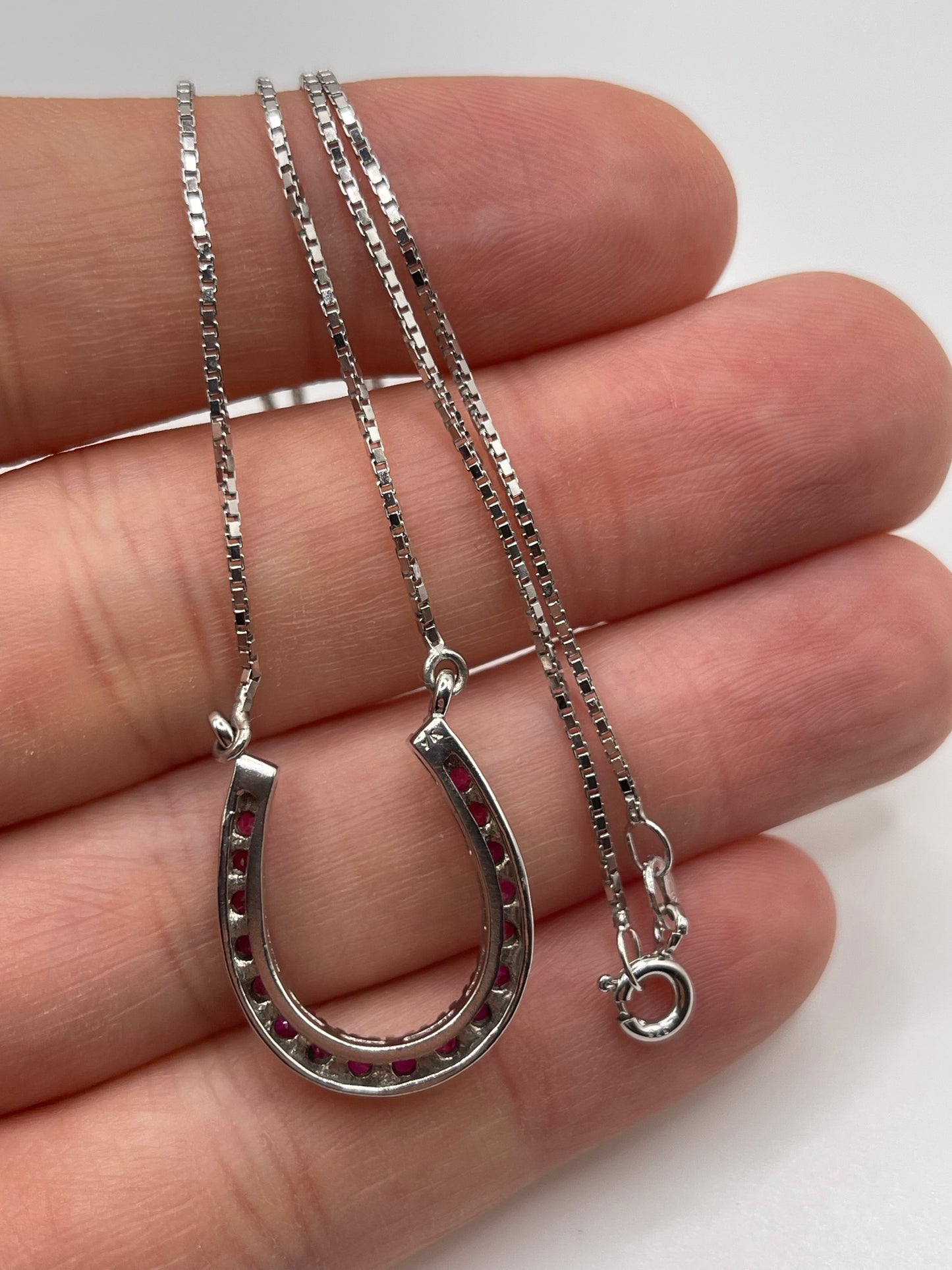 9ct white gold ruby horseshoe necklace