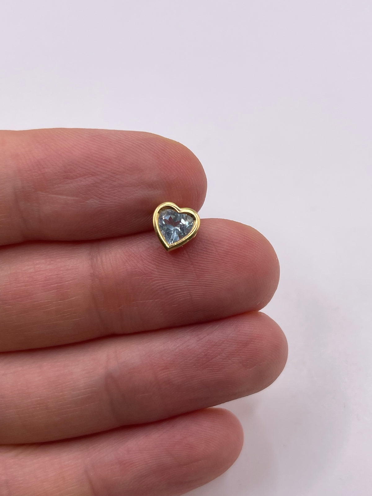 9ct gold blue topaz heart pendant