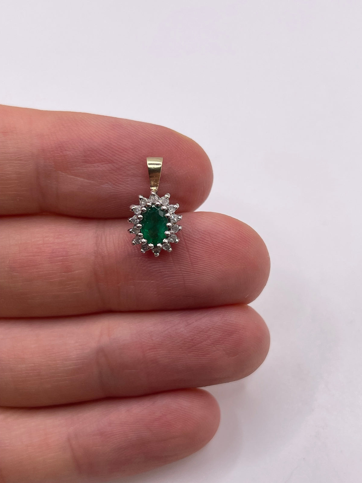 9ct gold emerald and diamond pendant