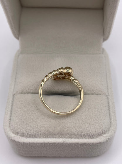 9ct gold pink topaz torque ring
