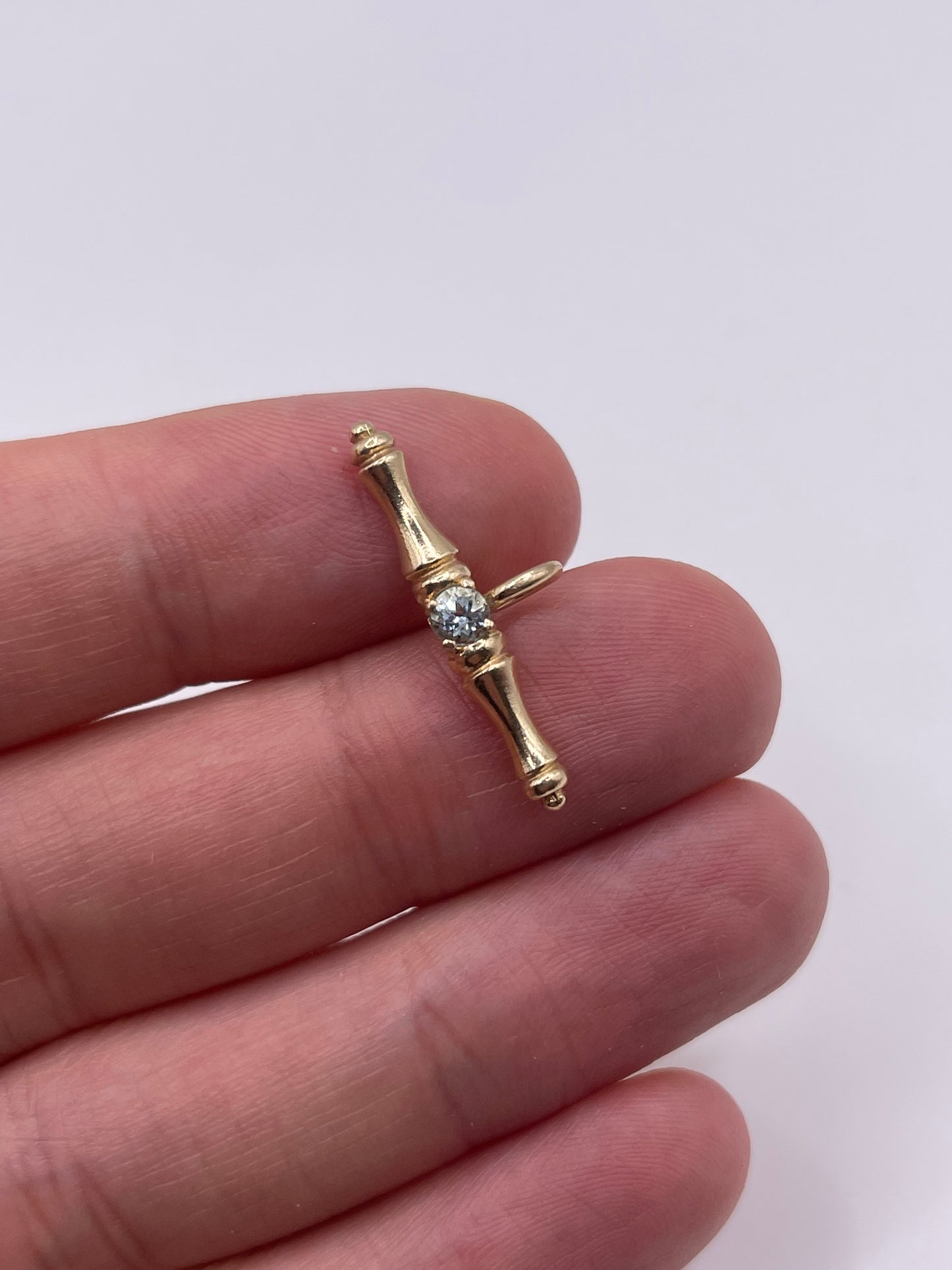 9ct gold blue topaz t bar pendant