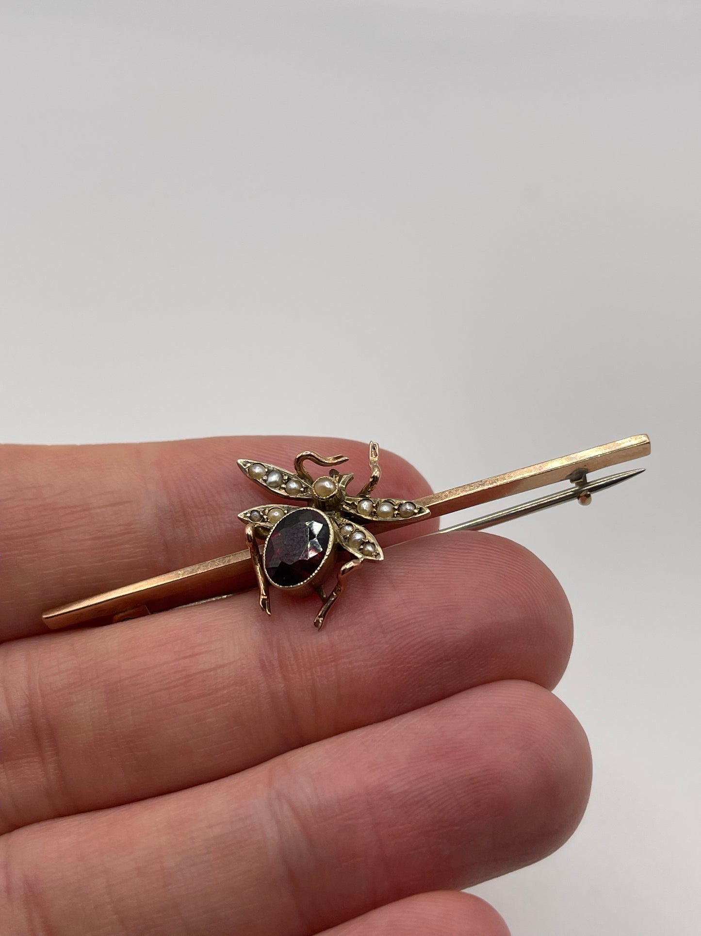 Antique 9ct rose gold garnet and pearl insect brooch