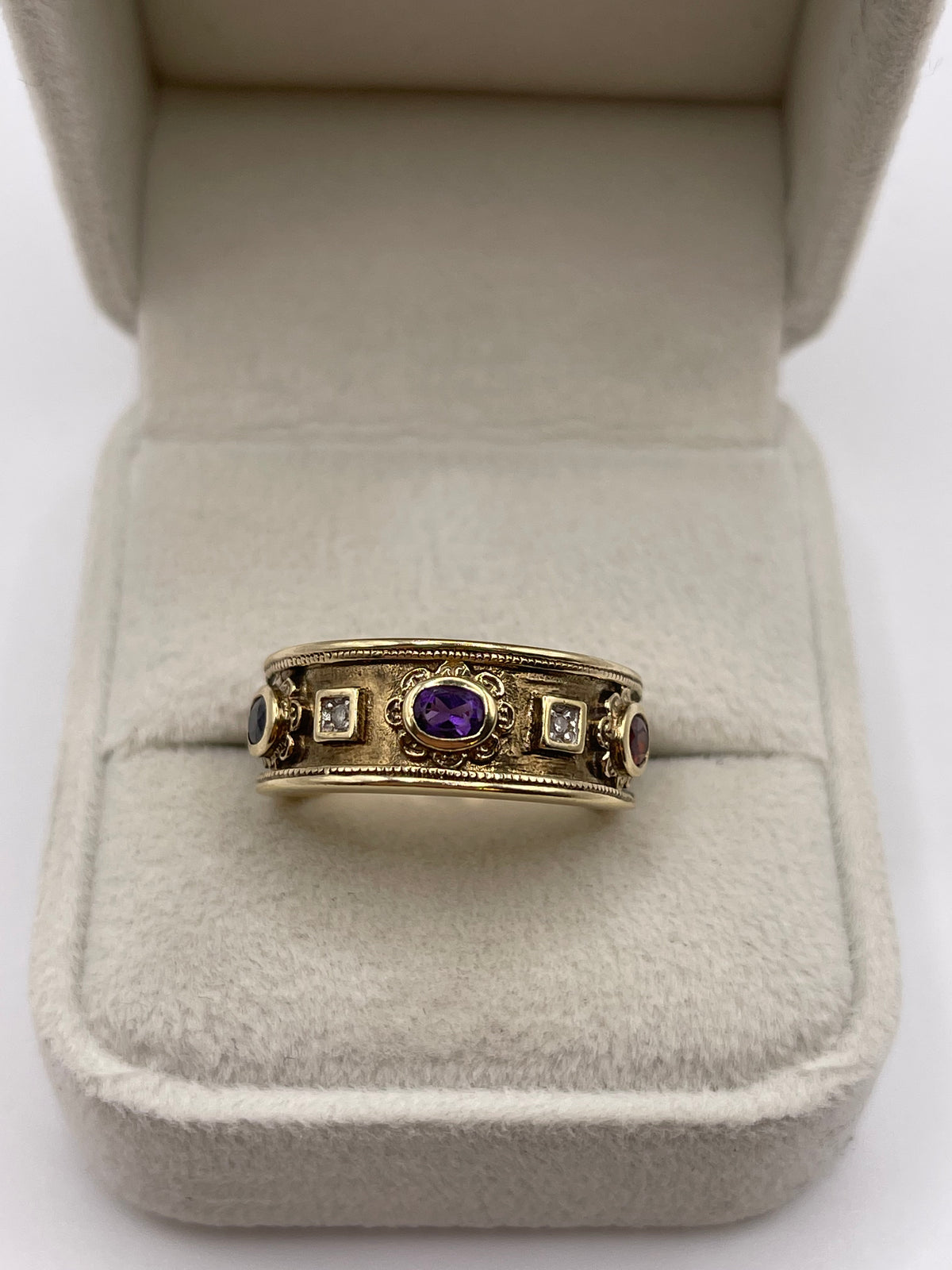 9ct gold garnet, amethyst, sapphire and diamond ring