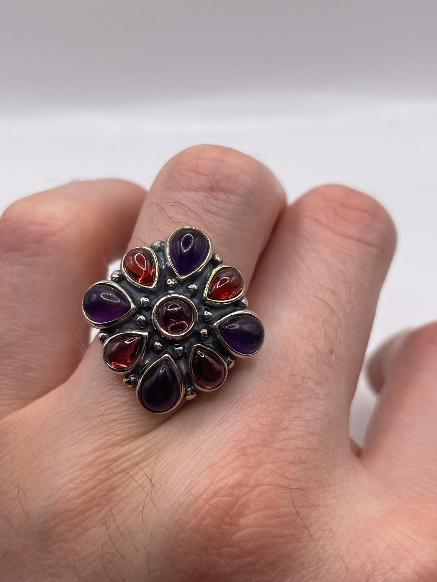 Silver amethyst and garnet ring