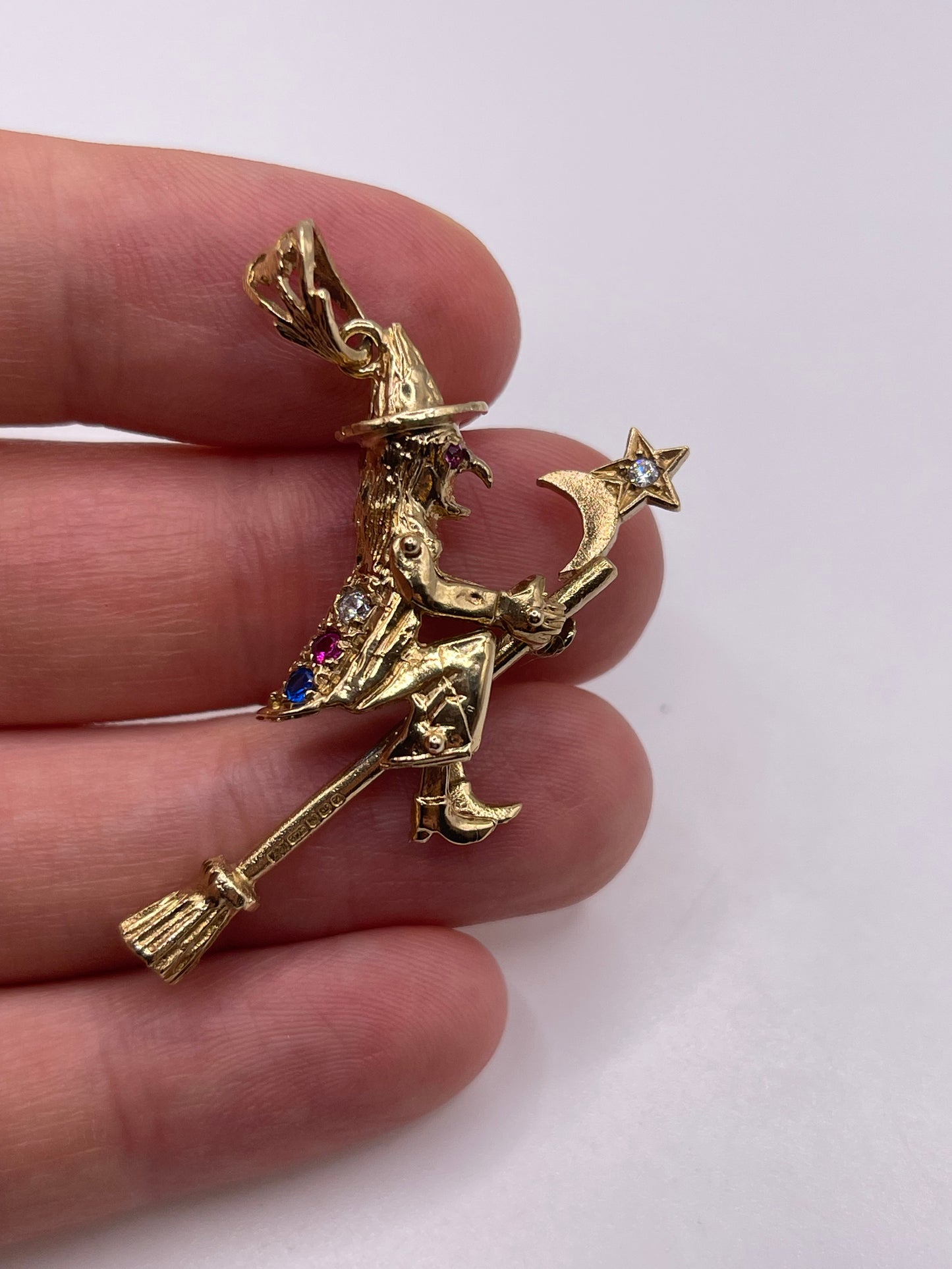 9ct gold articulated witch pendant