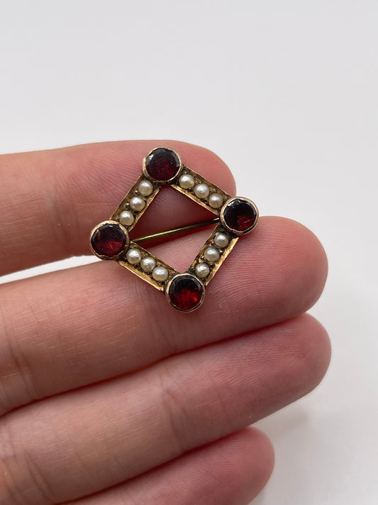 Antique 9ct rose gold garnet and pearl brooch