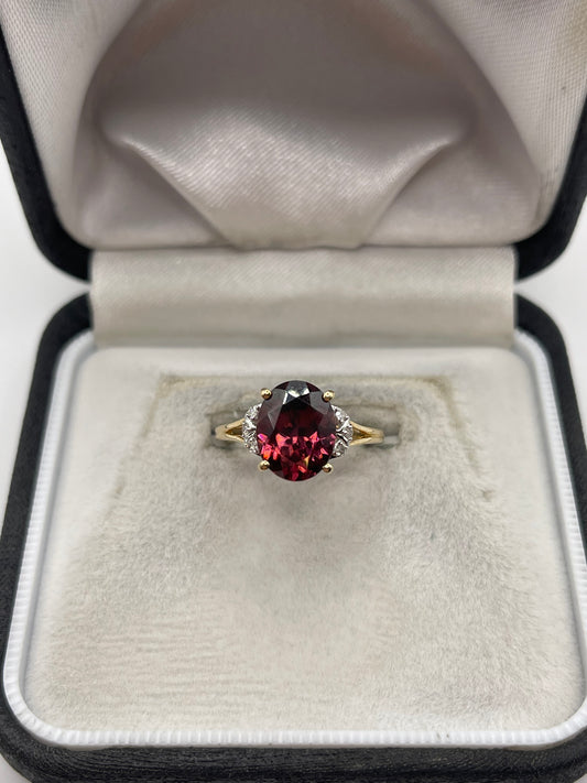 9ct gold zircon and diamond ring