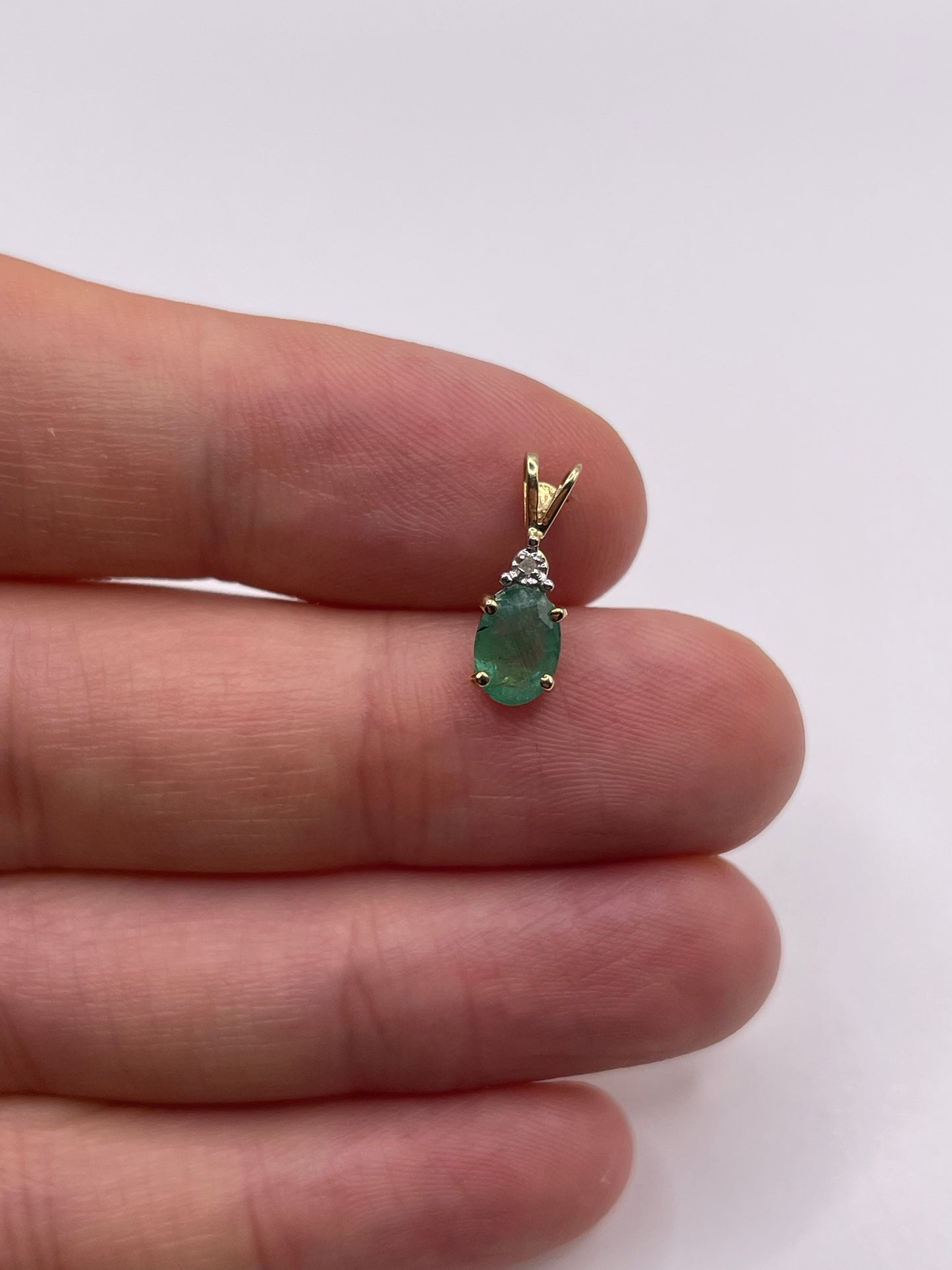 9ct gold emerald and diamond pendant