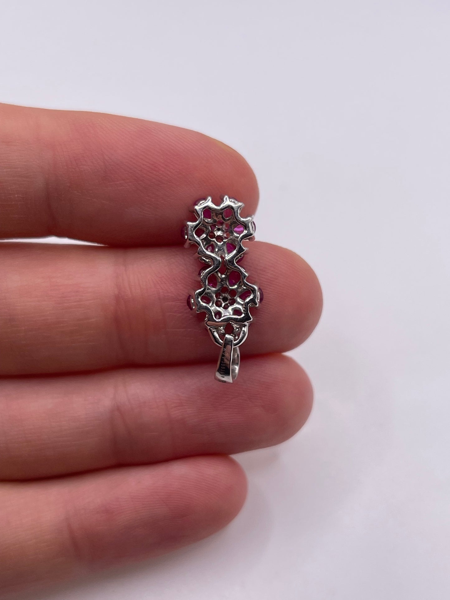 9ct white gold ruby and diamond pendant