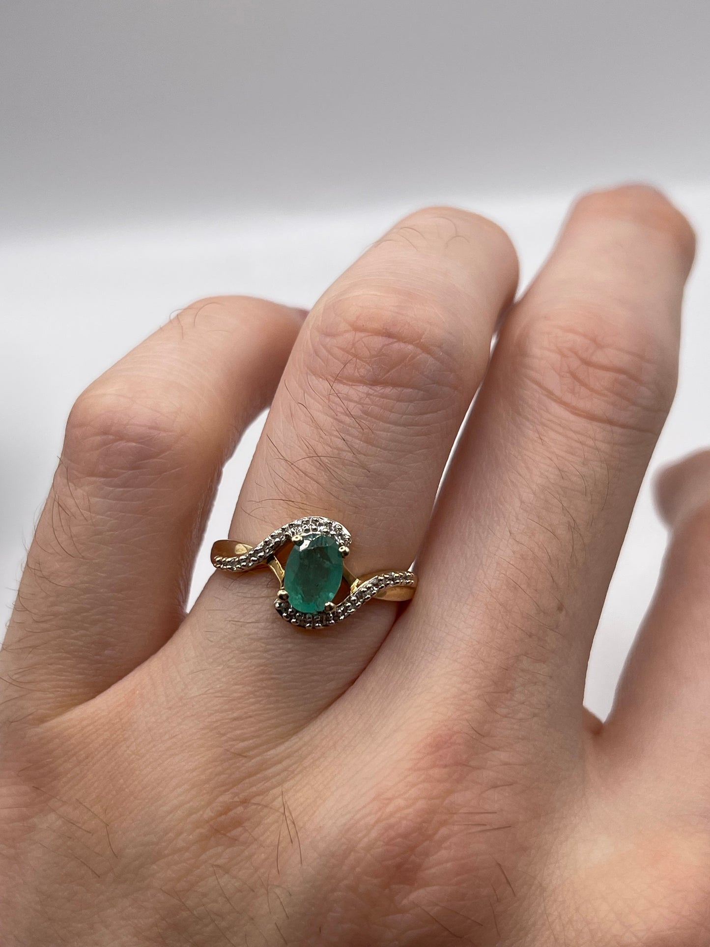 9ct gold emerald and zircon ring