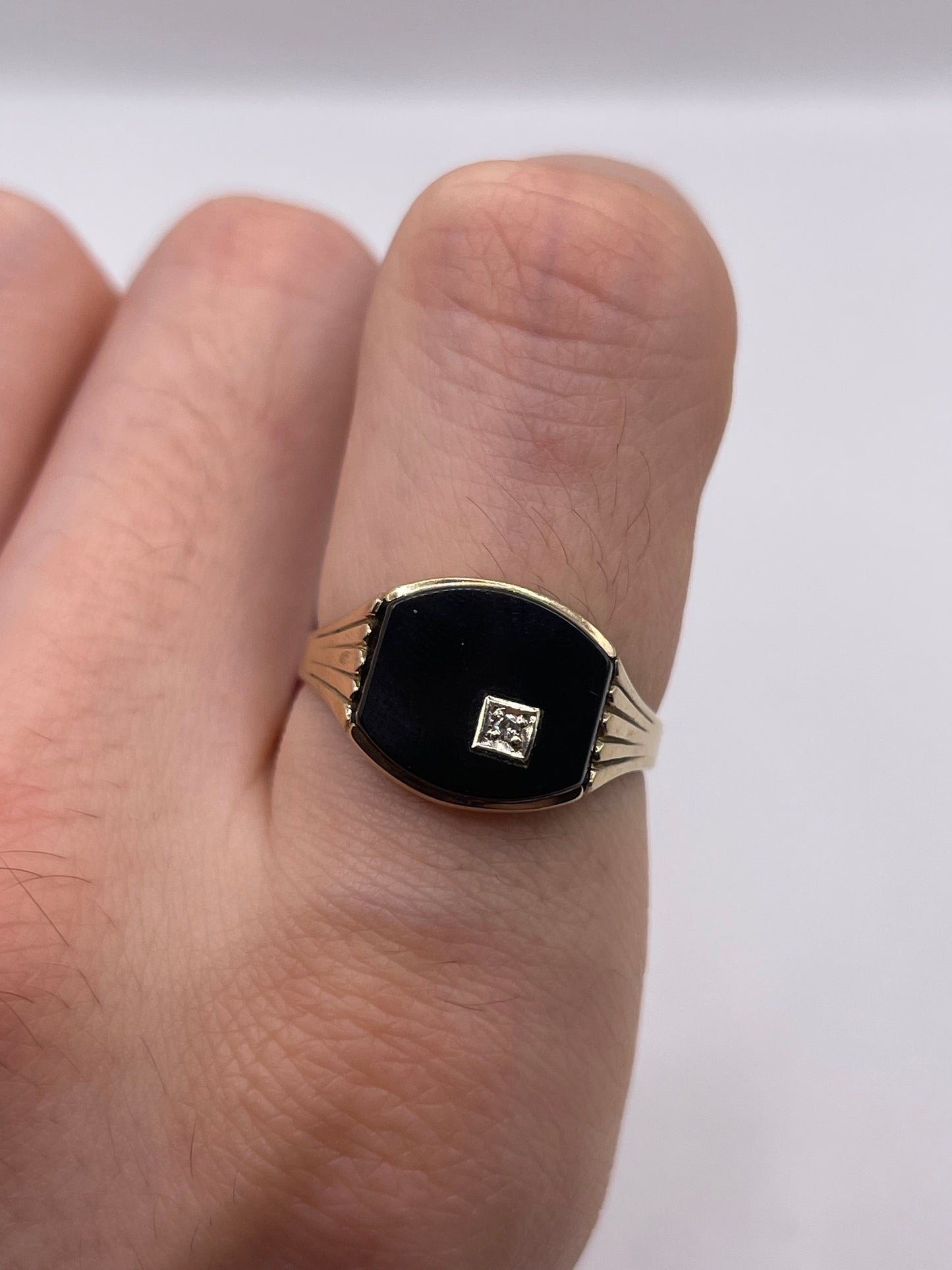 9ct gold onyx and diamond signet ring