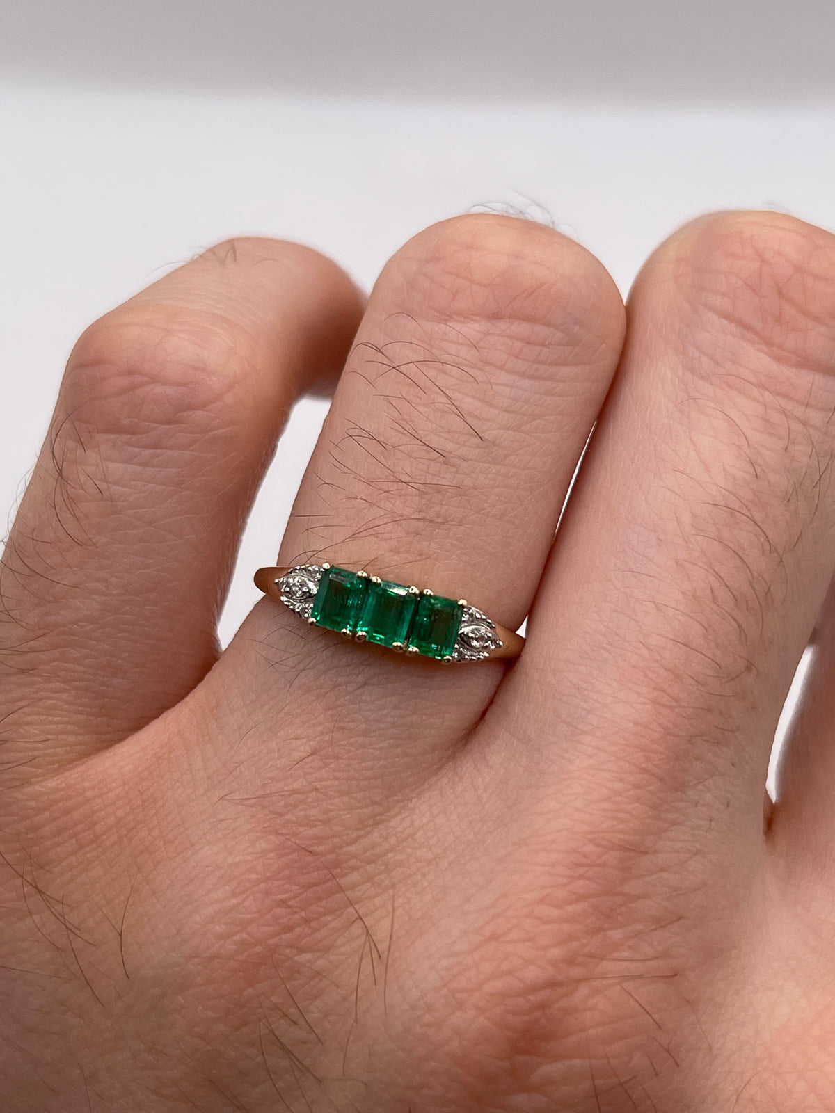 9ct gold emerald and zircon ring