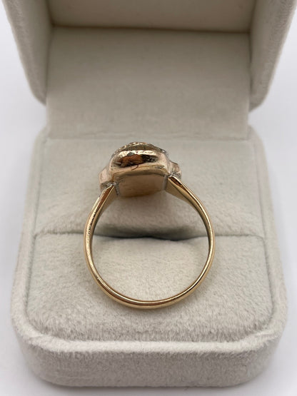 Heavy 9ct gold diamond skull ring
