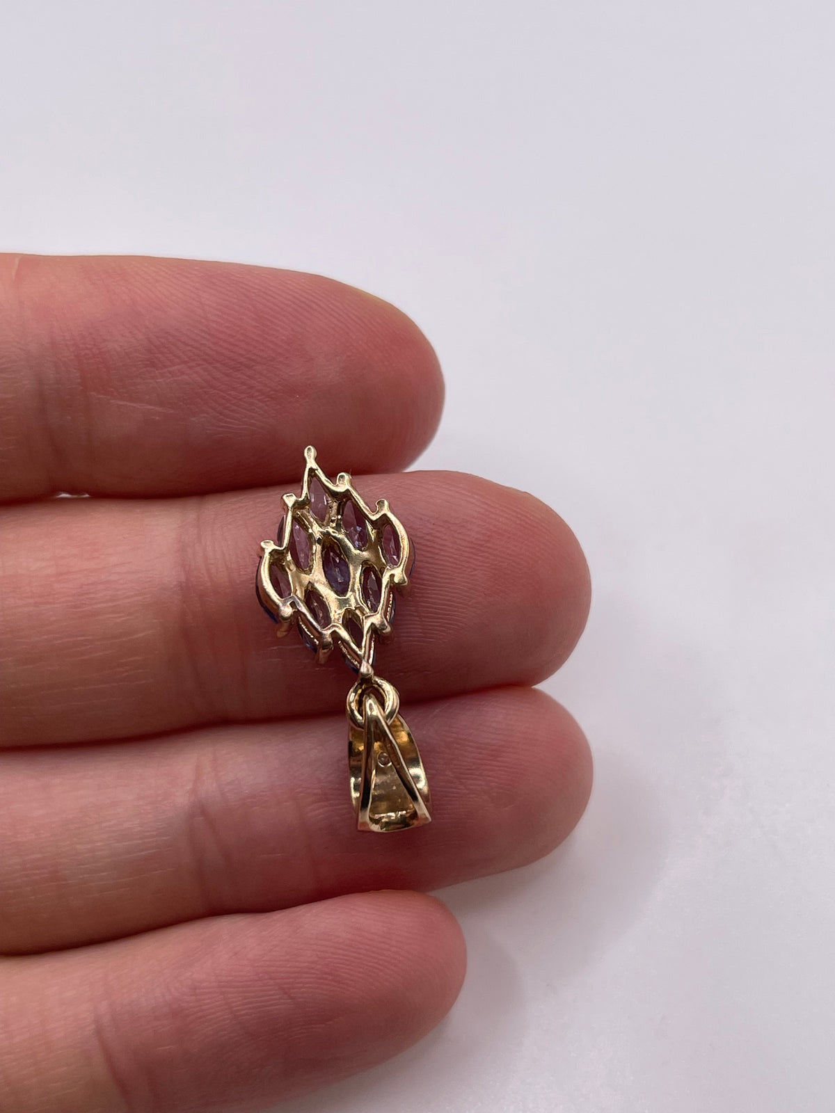 9ct gold tanzanite and diamond pendant