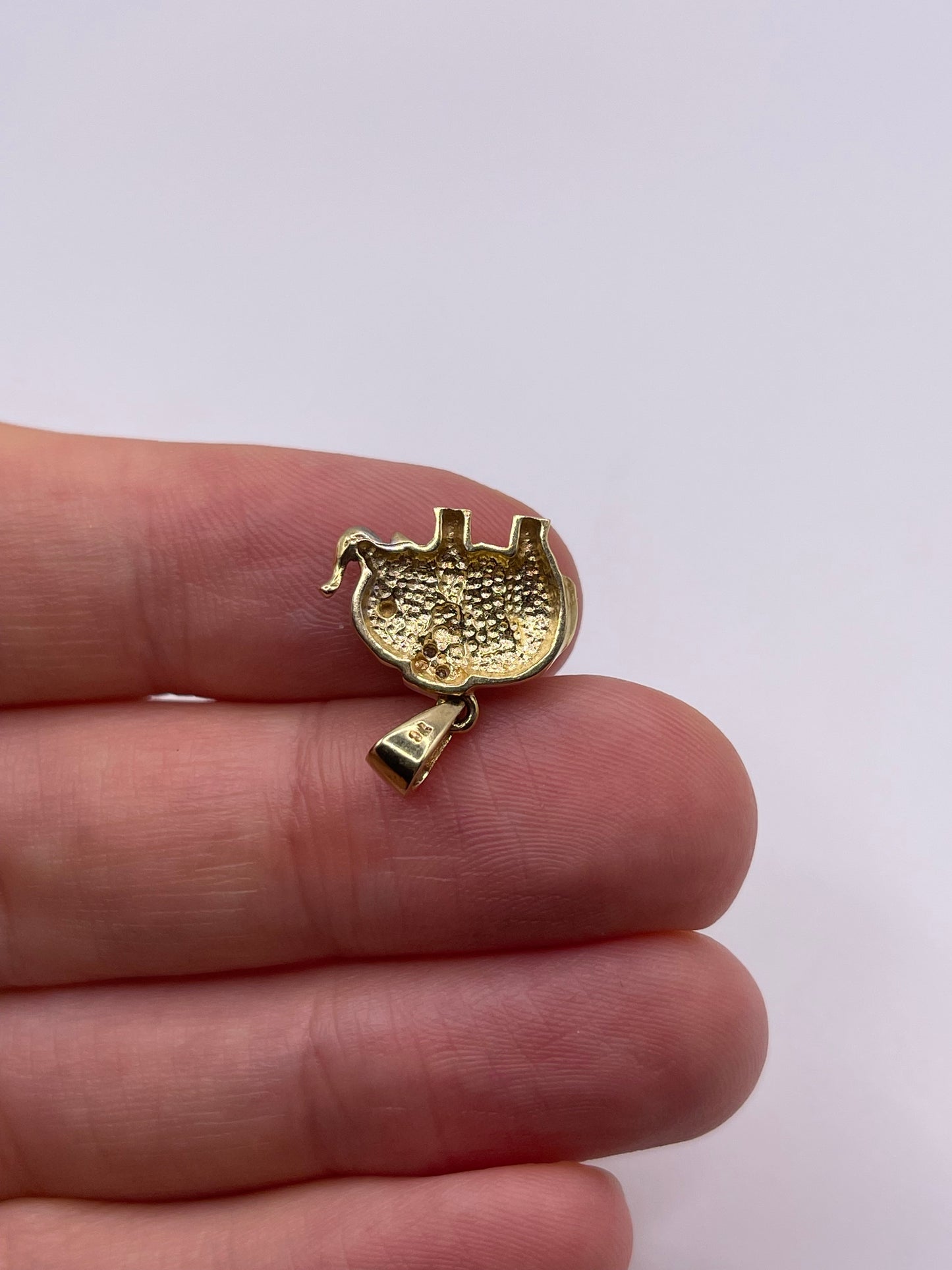 9ct gold diamond elephant pendant