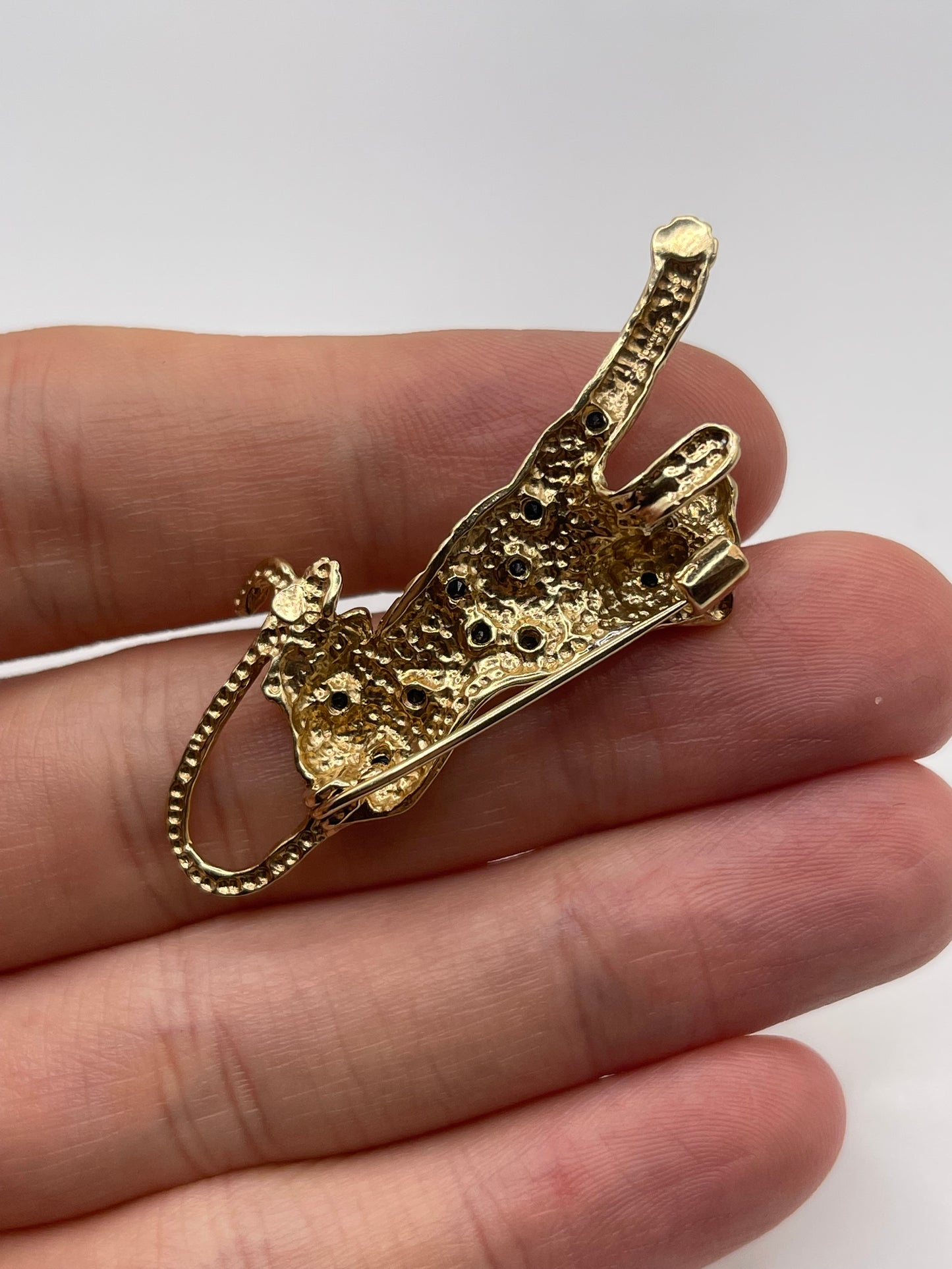9ct gold ruby, diamond and sapphire panther brooch