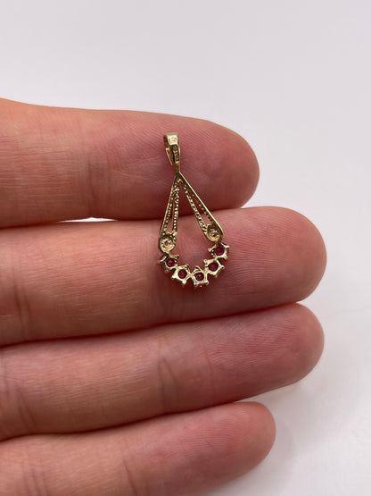 9ct gold ruby and diamond pendant