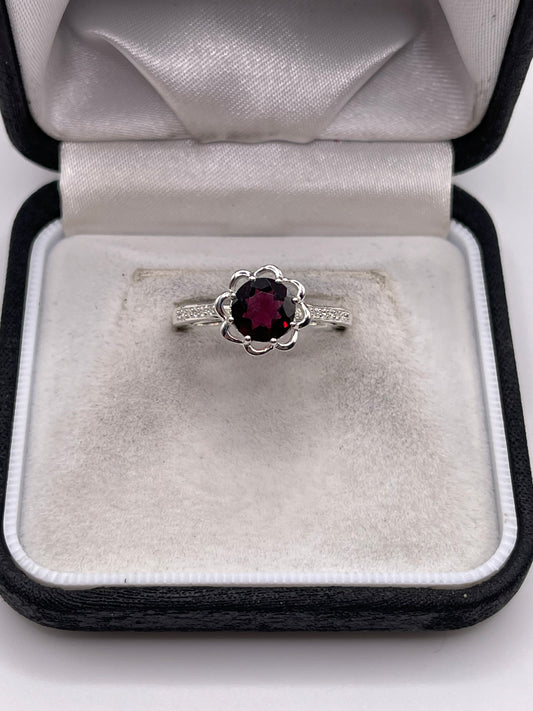 Silver garnet and zircon ring