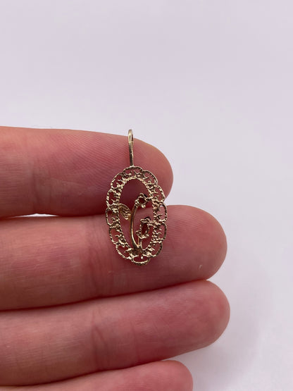 9ct gold garnet flower pendant