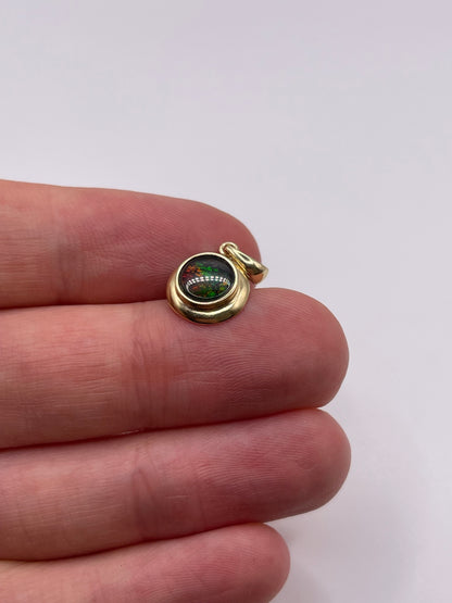 14ct gold Ammolite pendant