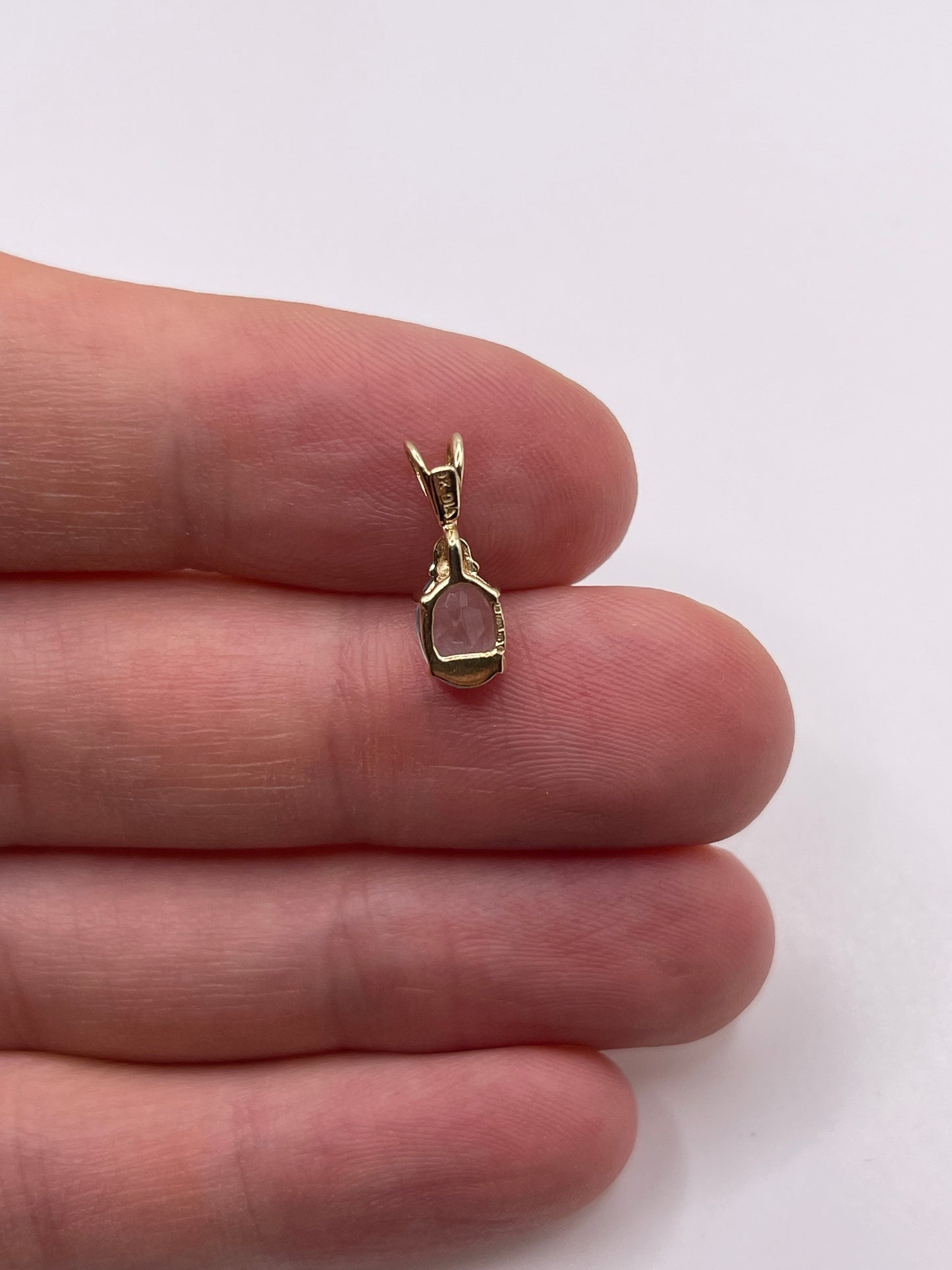 9ct gold topaz and diamond pendant