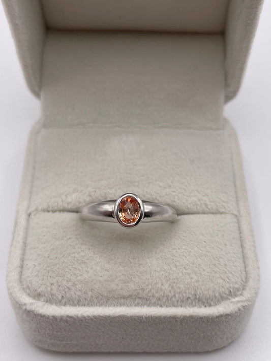 9ct white gold orange sapphire ring