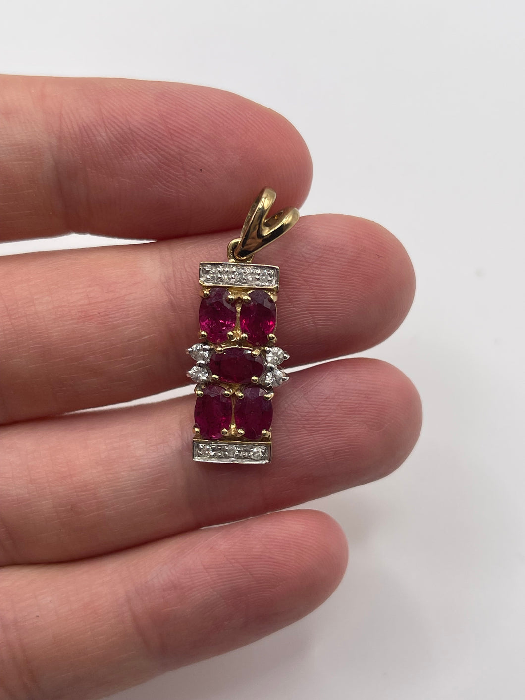 9ct gold ruby and zircon pendant