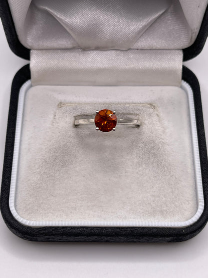 Silver topaz ring