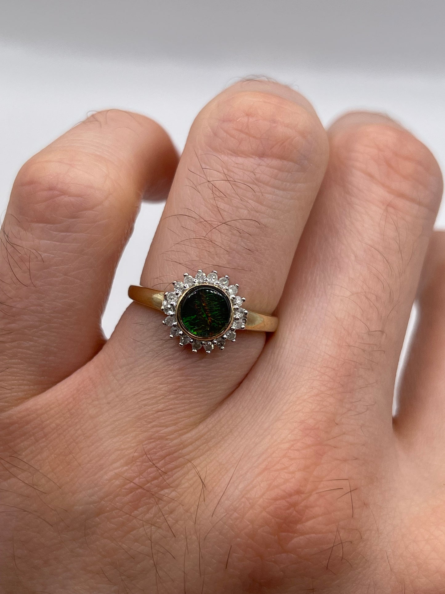 9ct gold Ammolite and diamond ring