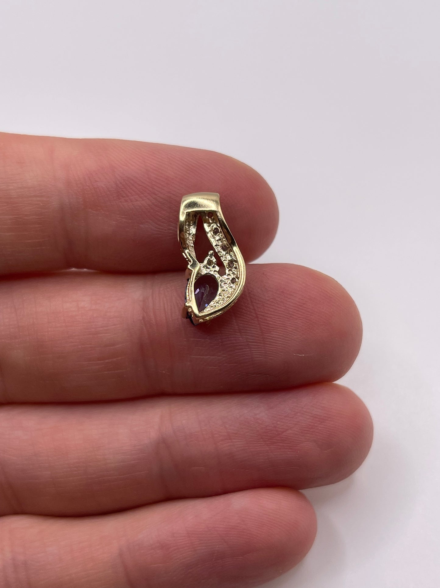 9ct gold tanzanite and diamond pendant