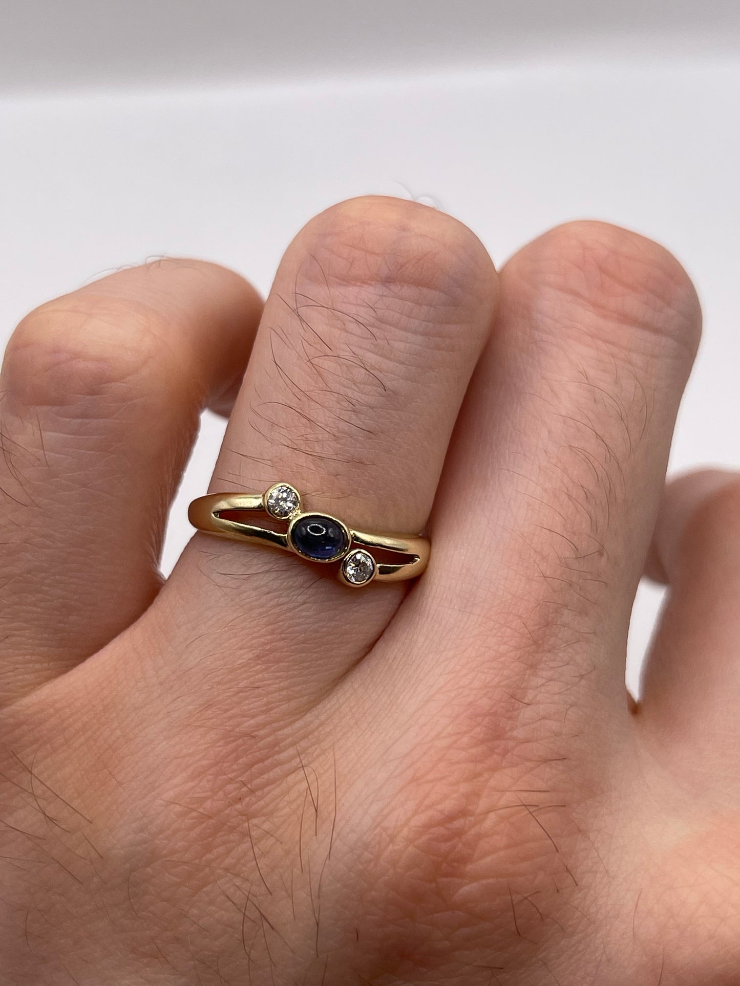 14ct gold cabochon sapphire and cz ring