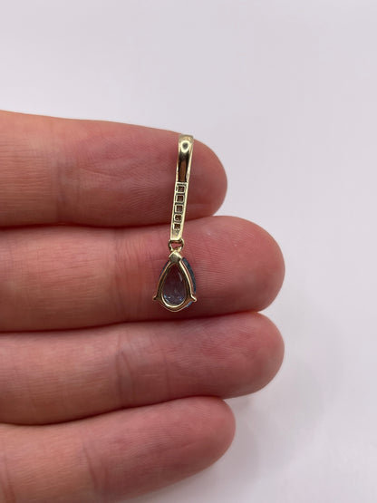 9ct gold topaz and diamond pendant