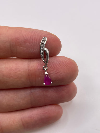 9ct white gold ruby and diamond pendant