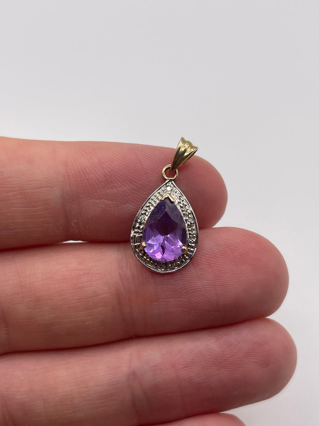 9ct gold amethyst and diamond pendant