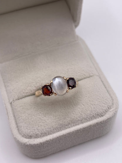 9ct rose gold moonstone and garnet ring