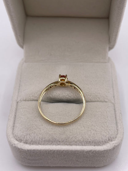 9ct gold spessartite garnet and diamond ring