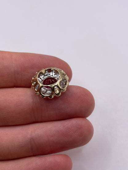 9ct gold topaz, quartz and diamonx pendant