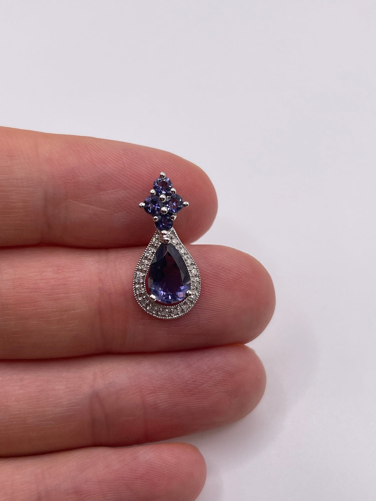 9ct white gold iolite and diamond pendant