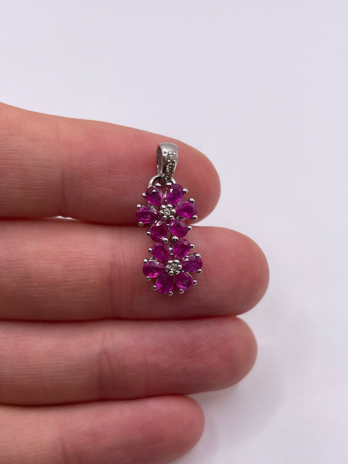 9ct white gold ruby and diamond pendant